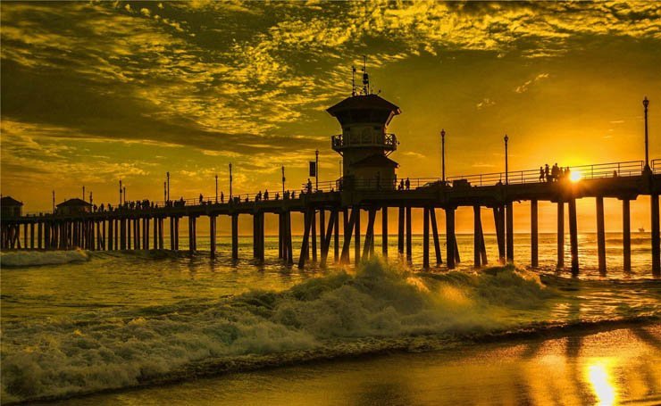 Pier sky sunset wave sea waves ocean beach water cloud