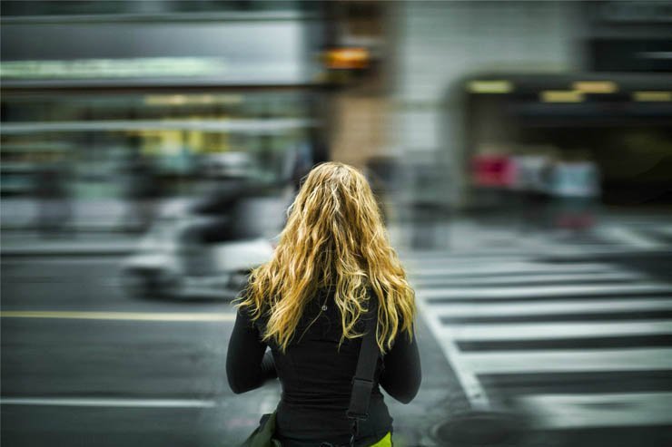 back girl crowd cross road traffic