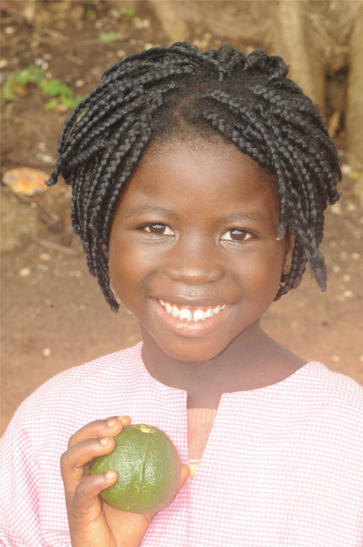face faces africa african village kid kids girl happy smile fruit