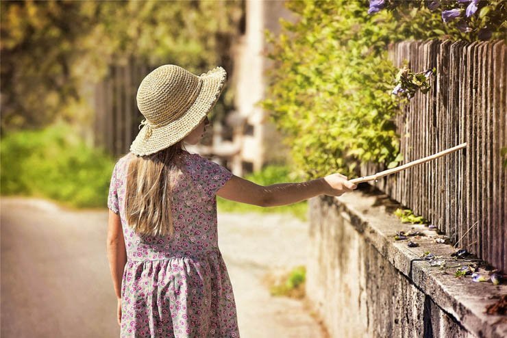 girl kids kid fence park stick hat wood wooden summer outdoor