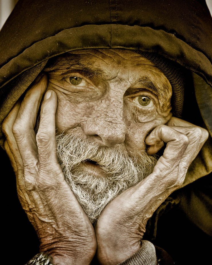 hands hand man old beard sad face look