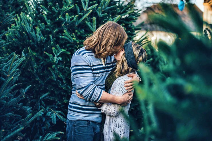 kissing kiss romantic romance couple man woman trees nature