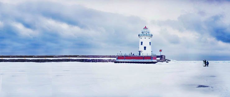 light house lighthouse water island ocean sea mountain sky cold winter snow snowy