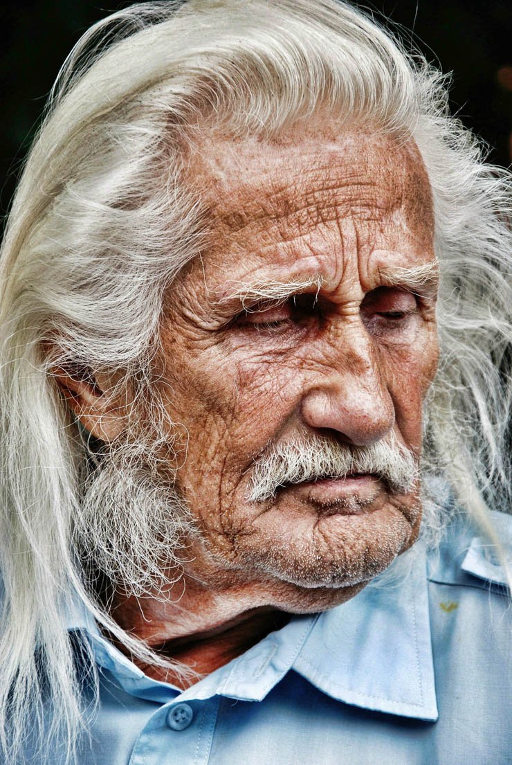 man old expression sad grey white hair