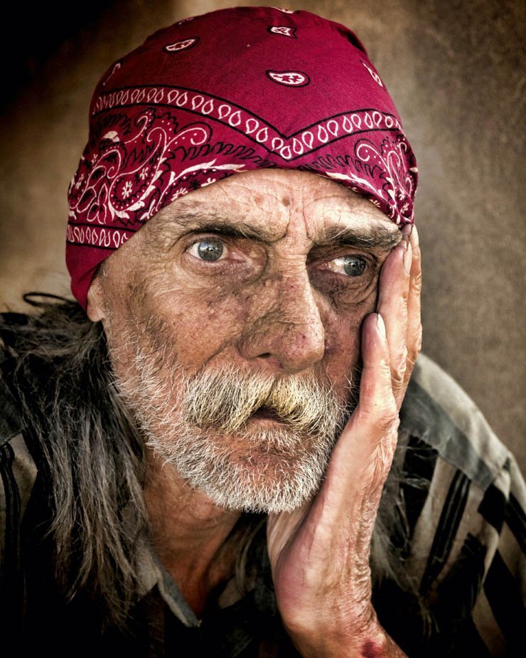 surprised man head band old beard expression