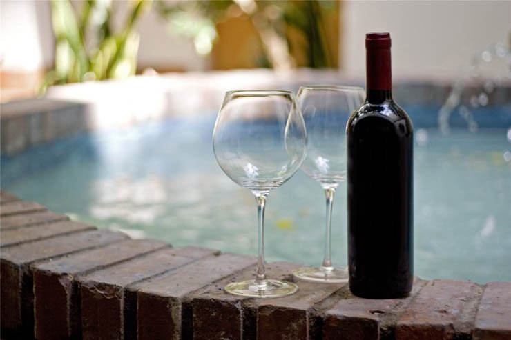 wine champagne alcohol alcoholic bar pub restaurant glass drink drinks pool red bottle bottles