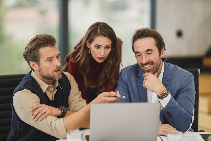 business finance formal job work employee working discussion colleagues woman men man woman boss manager leader laptop meeting