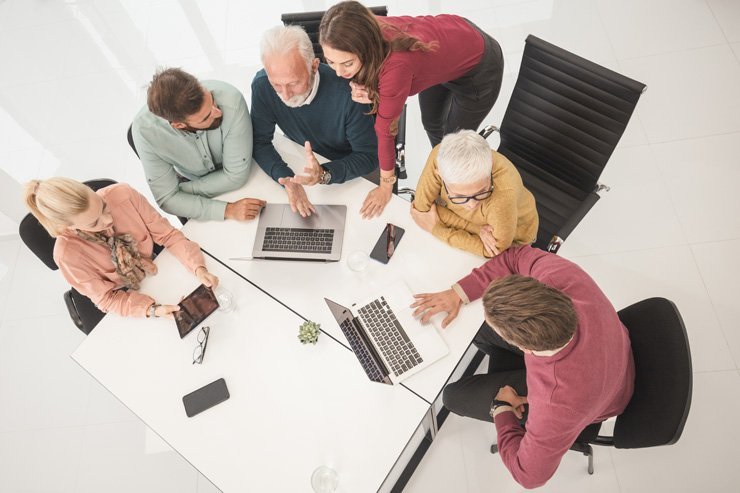 business finance formal job work employee working group meeting desk office startup discussion laptop