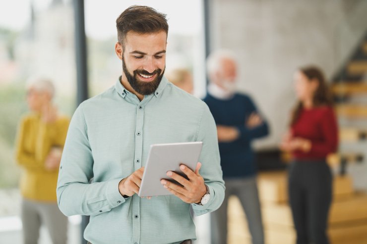 business finance formal job work employee working happy office desk tablet man men male