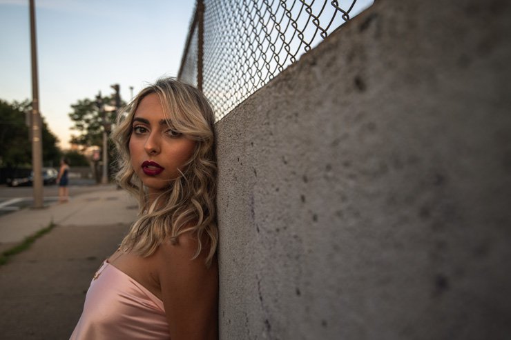 fashion beauty elegant elegance style stylish fashionista fashionable outfit fence wall blonde pink blouse lipstick street model woman lady women female makeup