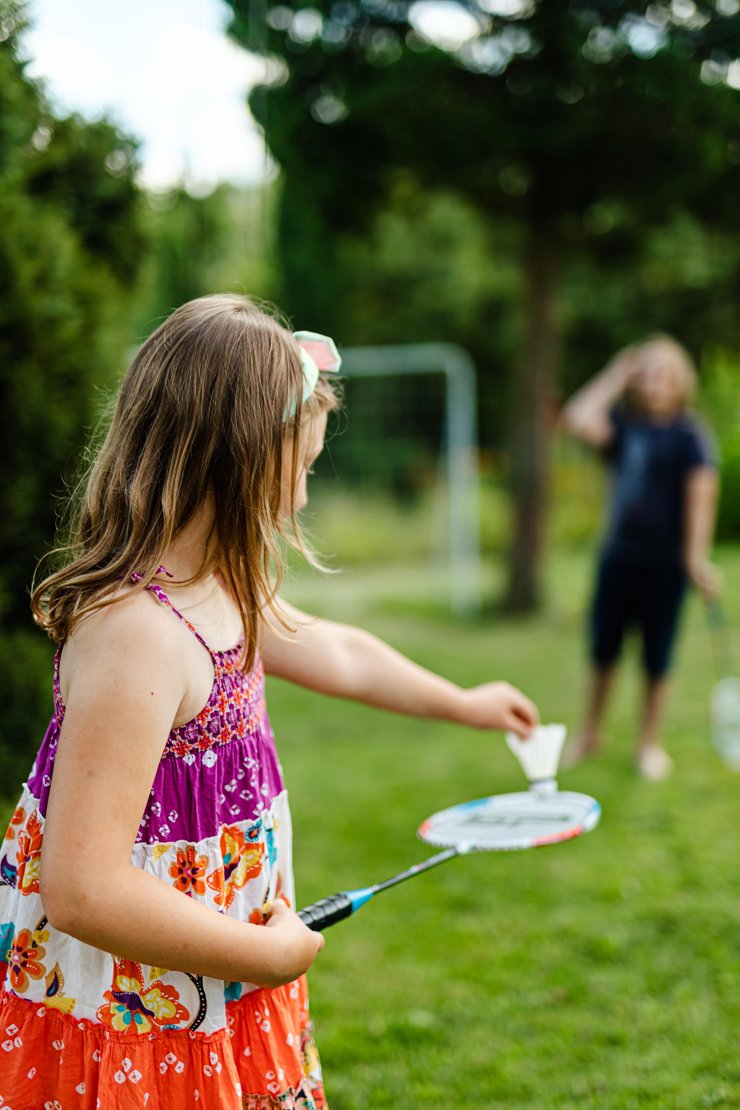 Girl Playing Badminton